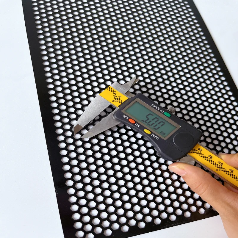 A variety of perforation patterns are combined to customize perforated metal plates - Image 2