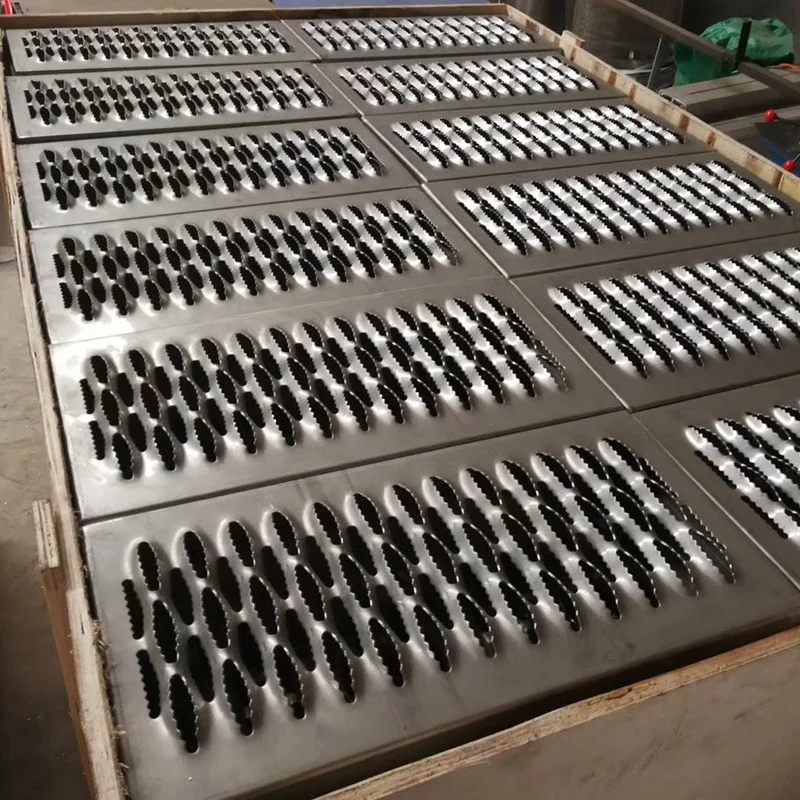 Steel stairs with jagged perforated non-slip metal footboards - Image 2